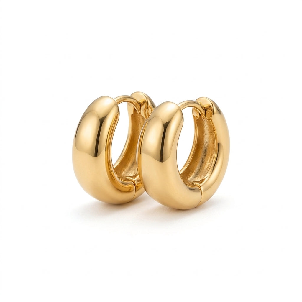 Chunky Gold Huggie Hoop Earrings on white background