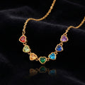 Rainbow Heart Charm Necklace on black velvet