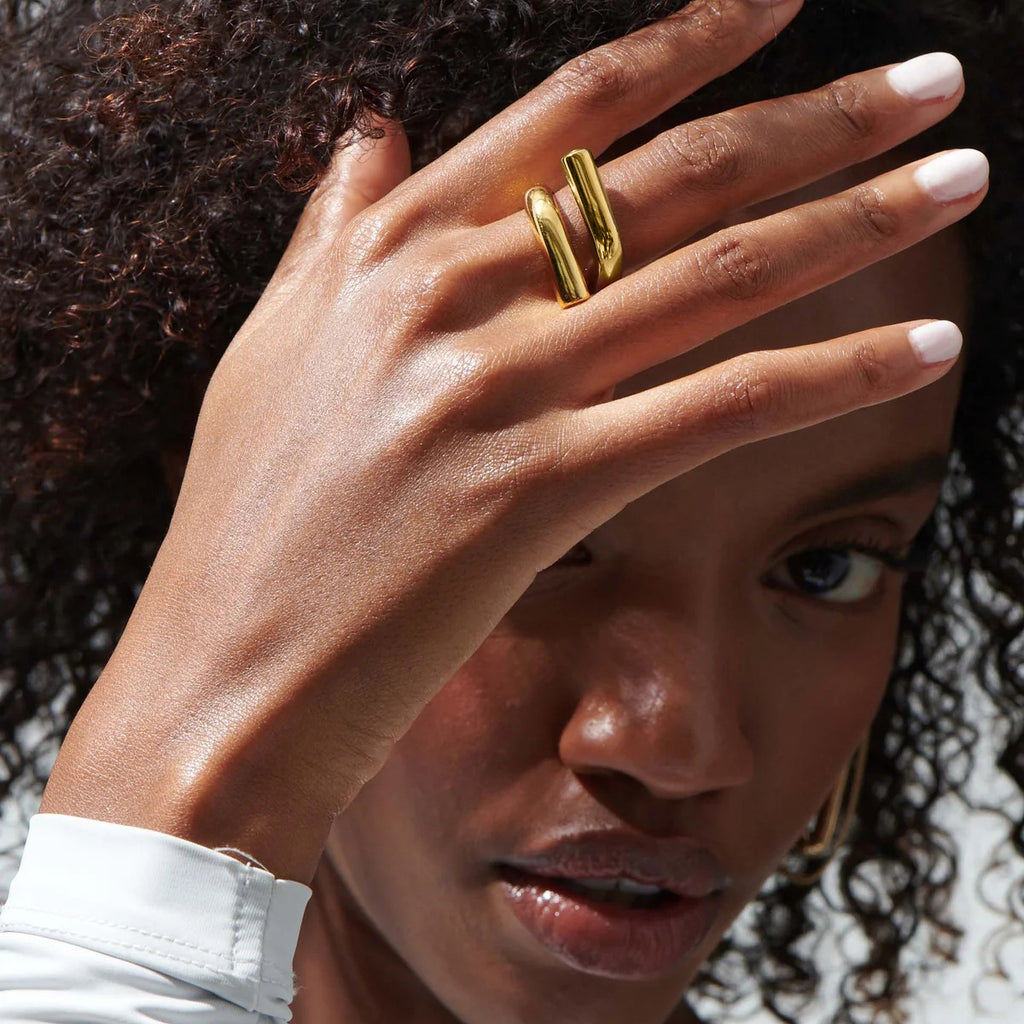 Sculptural Gold Nail Ring worn on hand