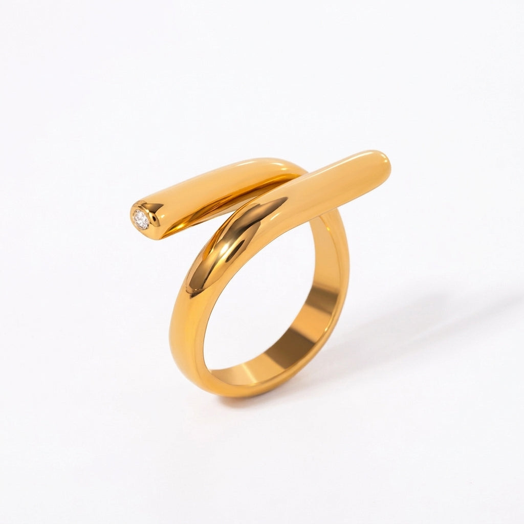 Sculptural Gold Nail Ring on white background