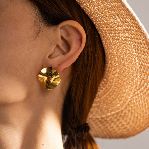Person wearing Crumpled Wave Gold Stud Earrings