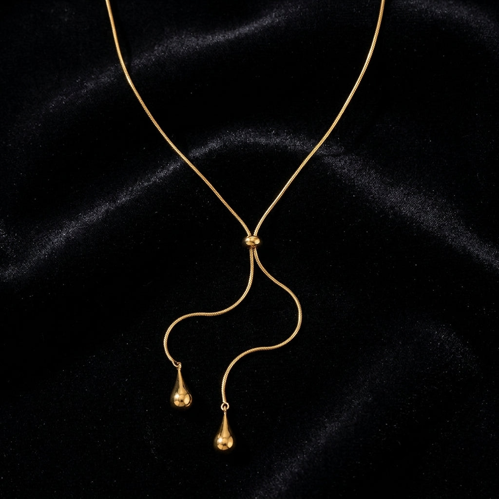 Minimalist Y-Lariat Necklace - Product on black velvet background