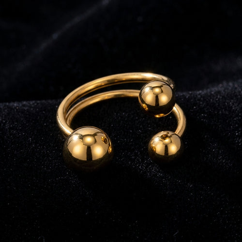 Gold Ball Open Ring - Product on black velvet background