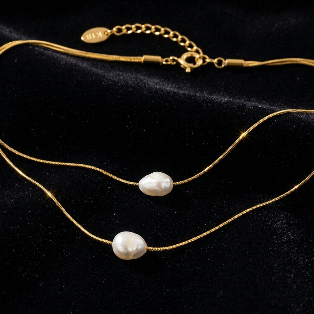 Layered Pearl Gold Chain Necklace - Product on black velvet background