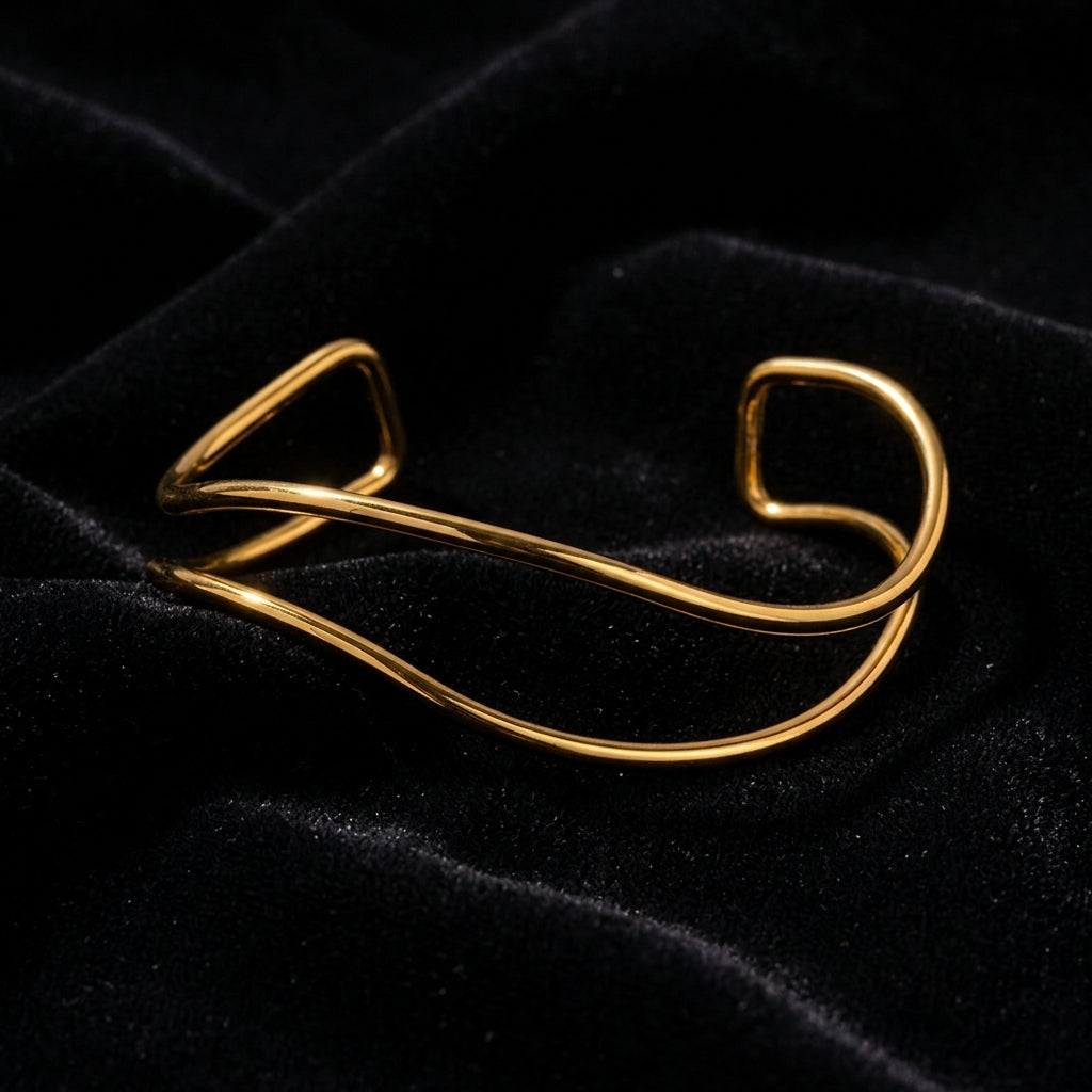 Open Wave Wire Cuff Bracelet - Product on black velvet background